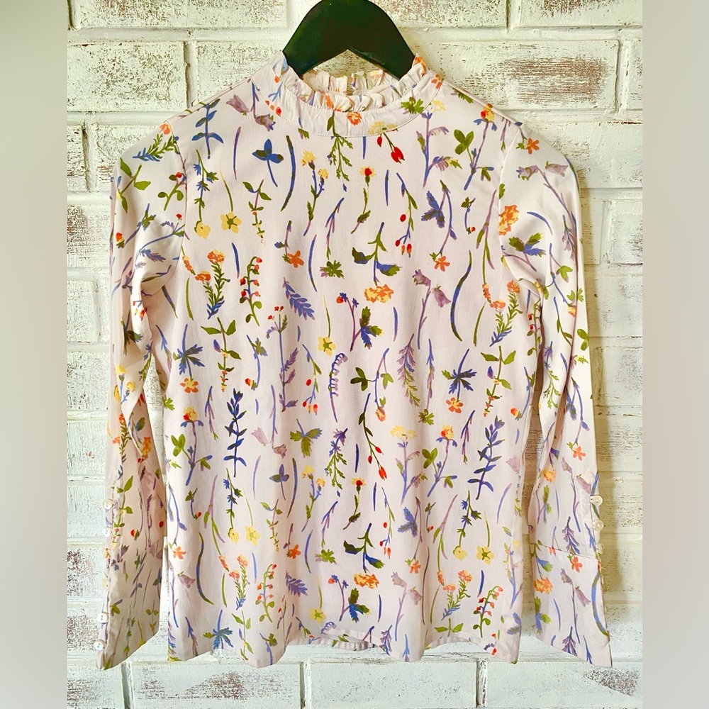 AND | Floral Blouse, lavender background. Runs small. Size 8. In new condition.